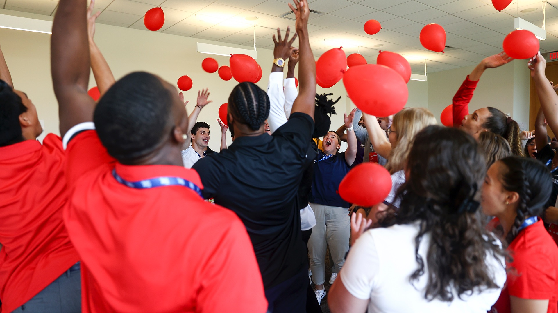 2023 Career in Sports Forum Attendees with Red Balloons