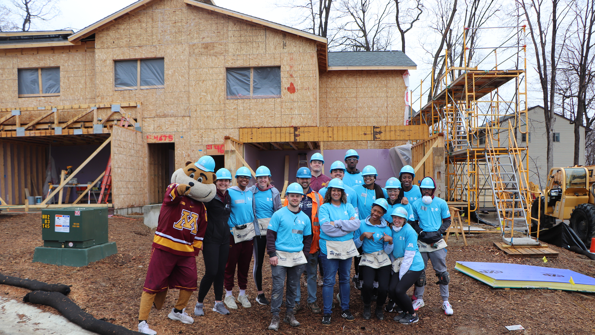 Minnesota student-athletes help with Habitat for Humanity build
