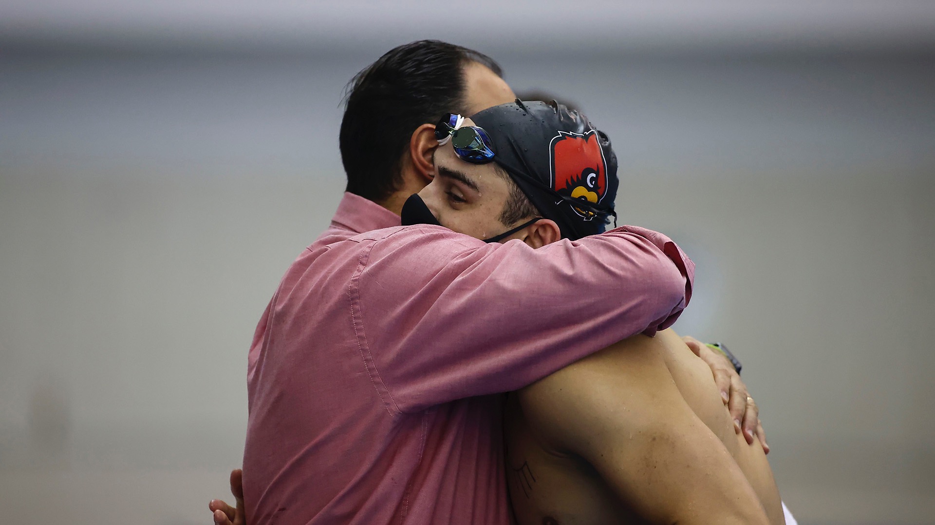 Nick Albiero and his father, Arthur, share a hug at the 2022 Atlantic Coast Conference championship.
