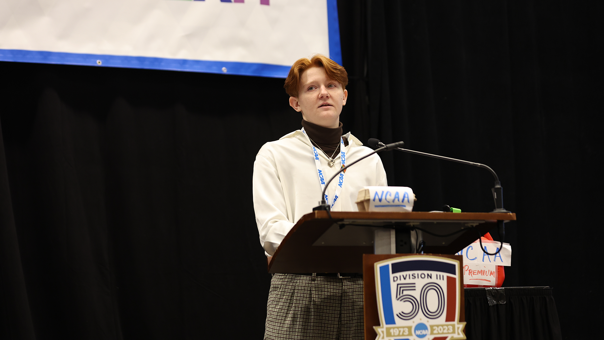 Slominski received the 2023 Division III LGBTQ+ Award for their advocacy efforts.  