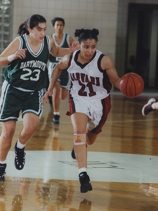 Allison Feaster playing for Harvard against Dartmouth in 1998