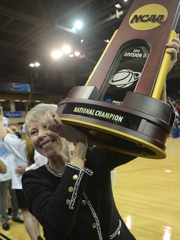 Barbara Stevens holds the 2014 NCAA Division II national championship trophy