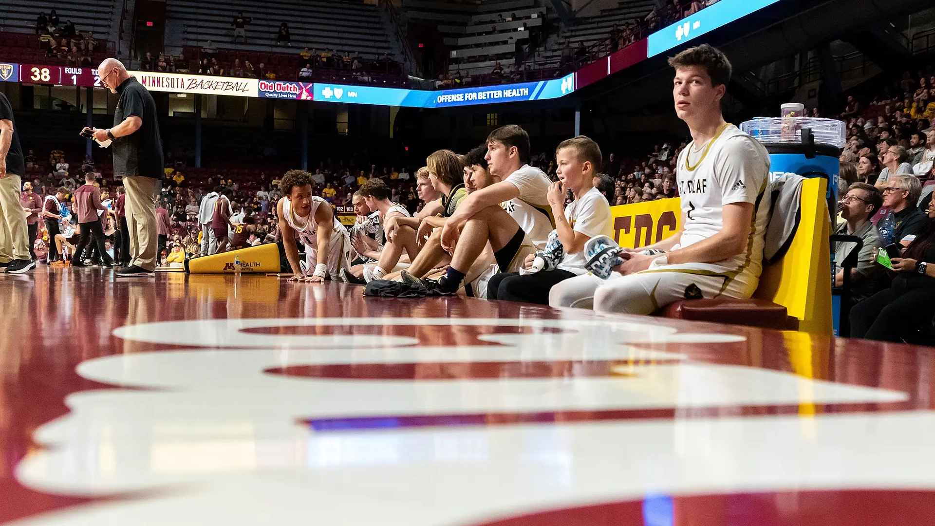 Torin on the team bench with his Oles