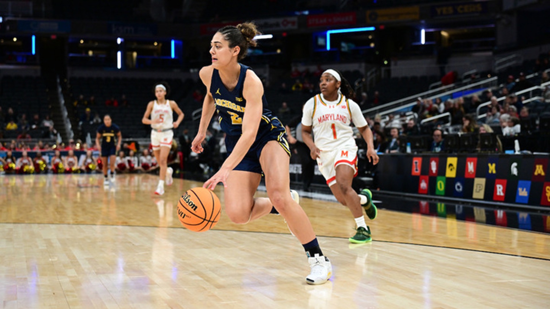 Macy Brown has flourished at Michigan, doing well in her classes and forming lifelong friendships. She wants to be a sportscaster in the future. (Photo courtesy of Michigan)