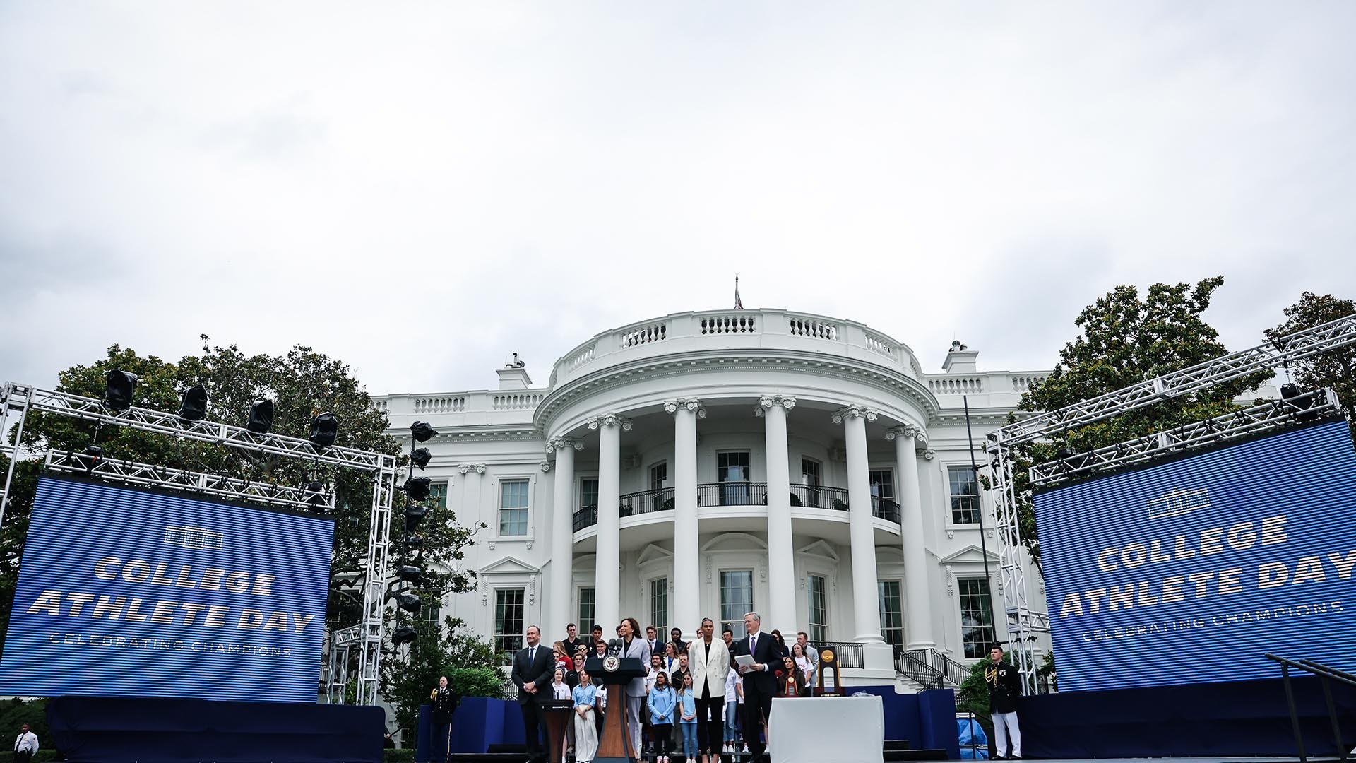 This is a photo of attendees in front of the White House for College Athlete Day on June 12, 2023.