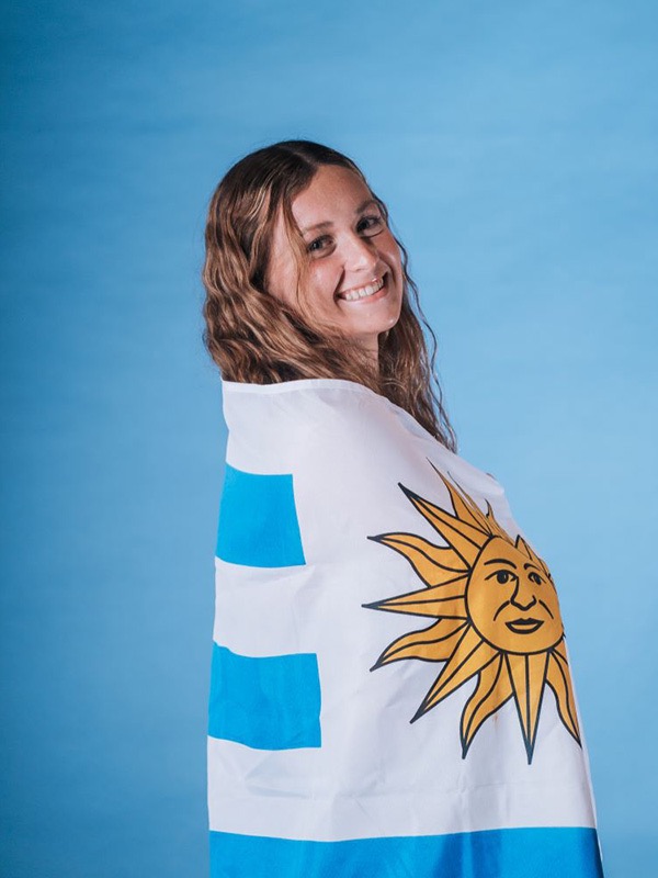Nicole Frank w/ Uruguayan Flag (Photo courtesy of FIU News)