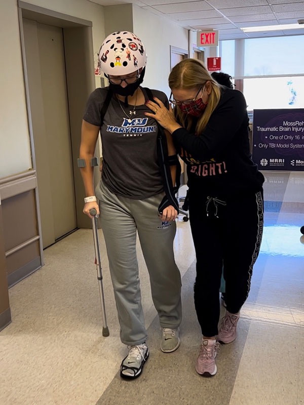 Loiseau spent weeks at a rehab center, where she learned to walk again.