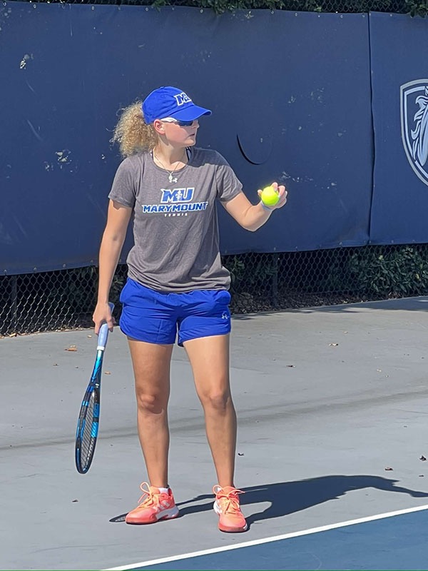Loiseau returned to action her junior year, playing her first match more than two years after her collapse and brain surgery.