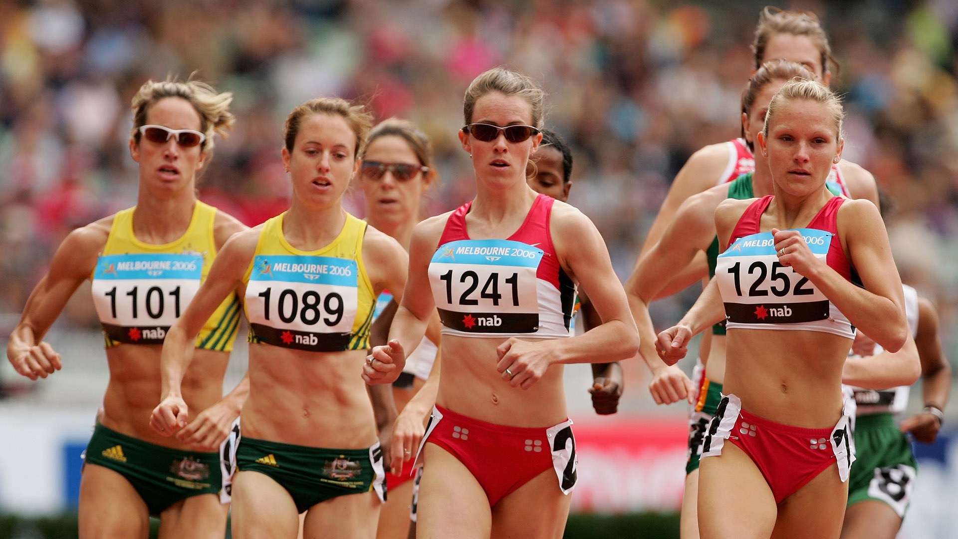 Malindi Elmore (second from right) running for Canada at the 2006 Commonwealth Games in Melbourne
