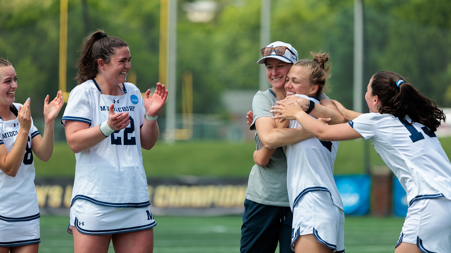 Shue celebrates with her team after winning her fourth national championship, capping off a historic career. (Photo by Ryan Hunt / NCAA Photos)