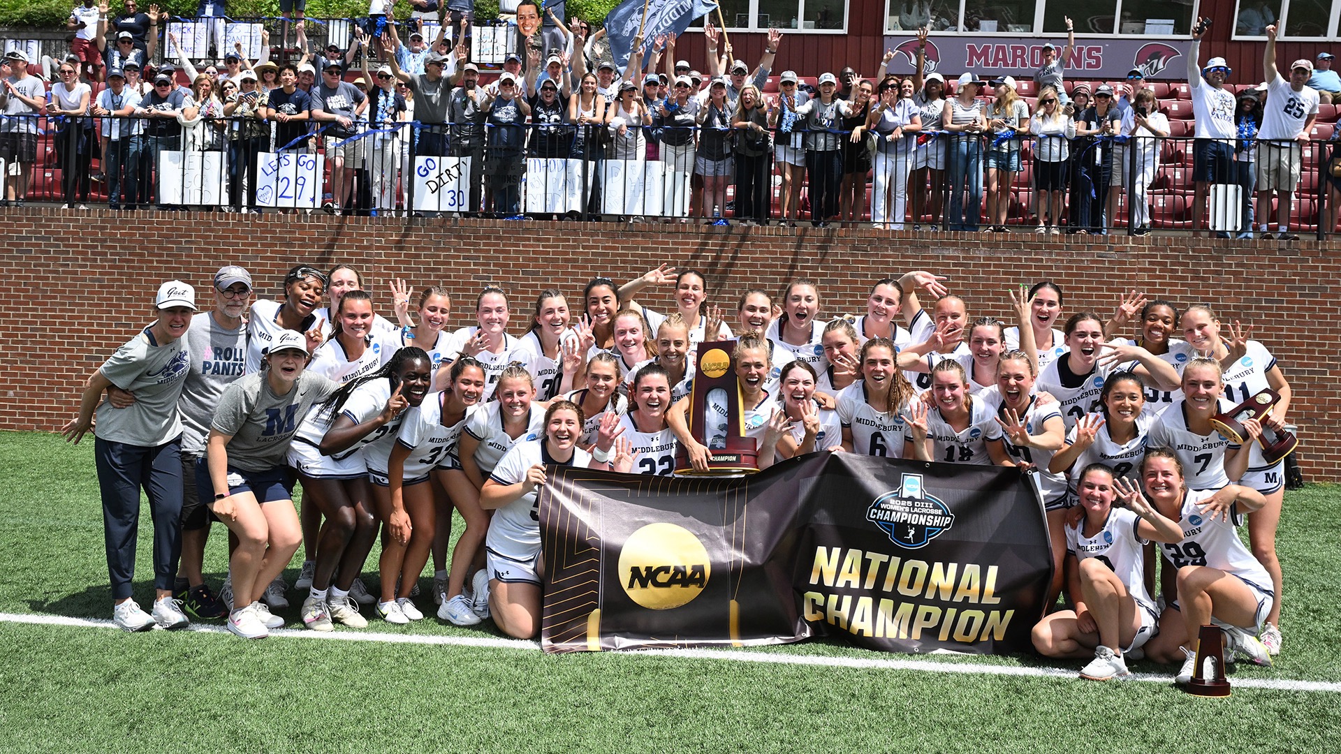 Shue and her teammates celebrate their 2025 Division III championship win, a 10-9 victory after trailing by as many as four goals. (Photo by Ryan Hunt / NCAA Photos)