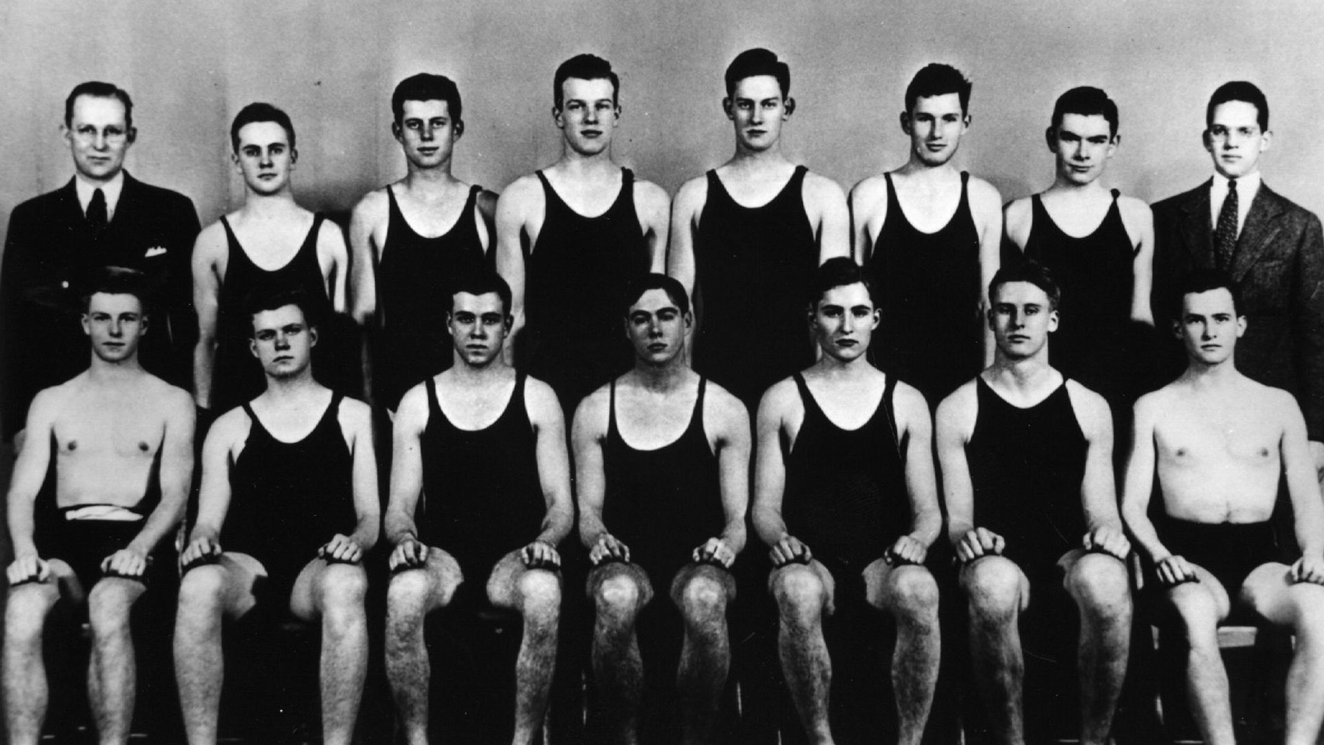 Kennedy a multisport athlete at Harvard, poses with swim team