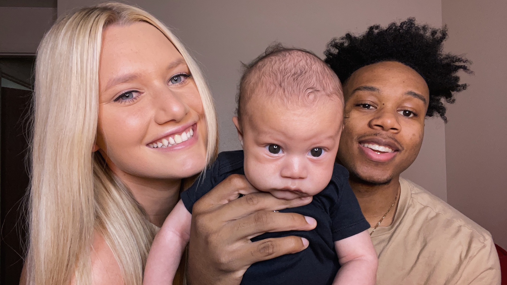 Jasmine and Zee Williams pose with their newborn, Zee Brysen. The couple navigated Jasmine's return to softball and parenthood side by side. (Photos courtesy of Jasmine Williams)