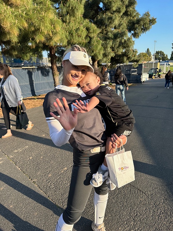 Jasmine and Zee Brysen smile after one of her games.