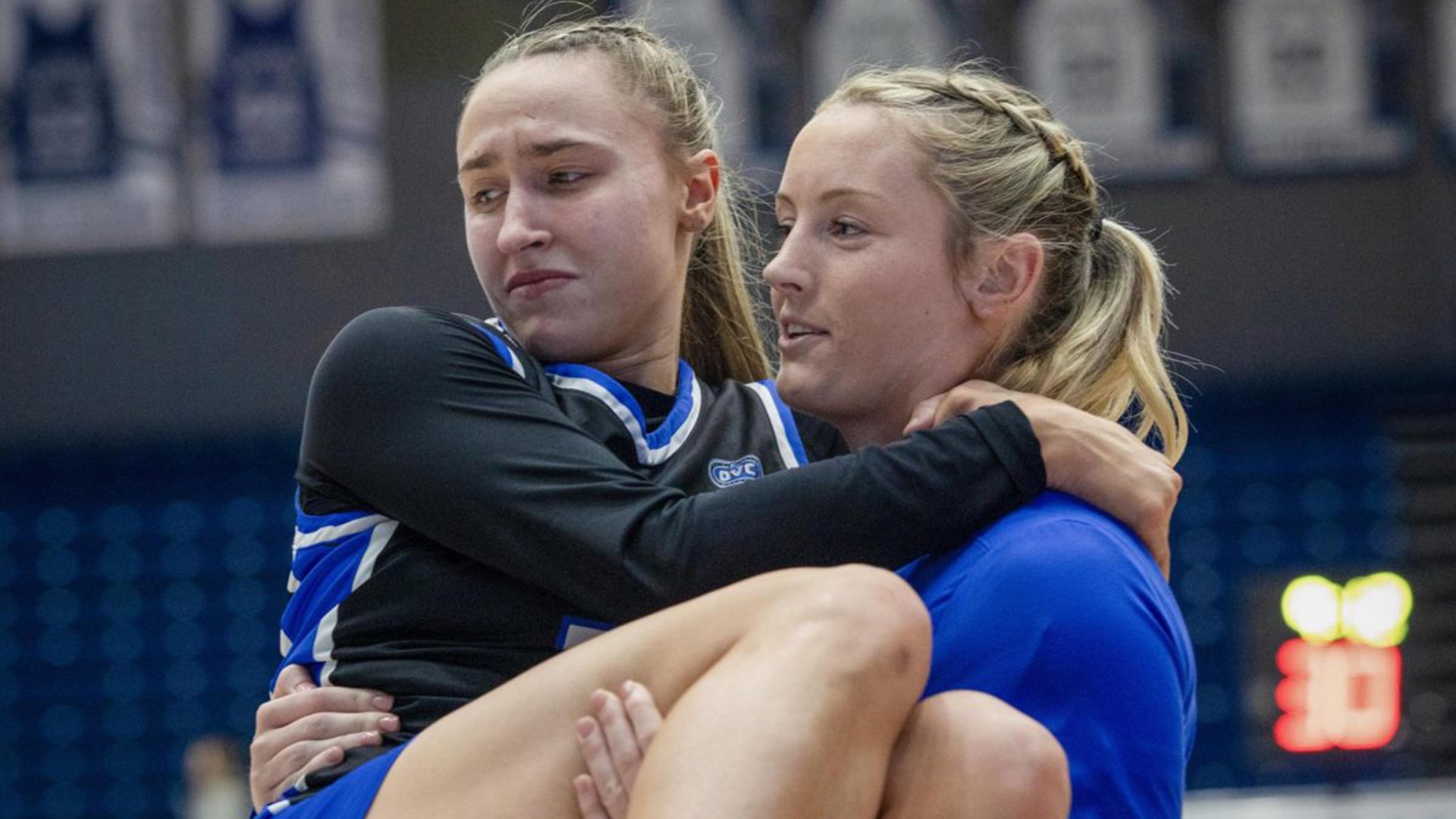 Fifth year, forward Jayda Johnston carries senior guard Kiyley Flowers off the court during the first quarter of the game against Tennessee State Tigers in Groniger Arena on the Eastern Illinois University on Feb. 13.