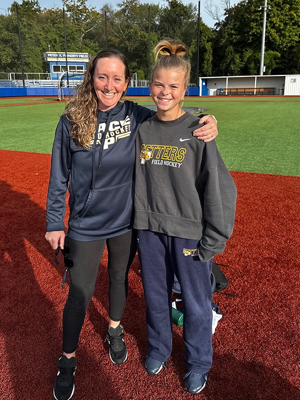 Fairhurst praises coach Kayte Biordi for her willingness to understand her hearing loss. "Me and Coach have this unbreakable bond."