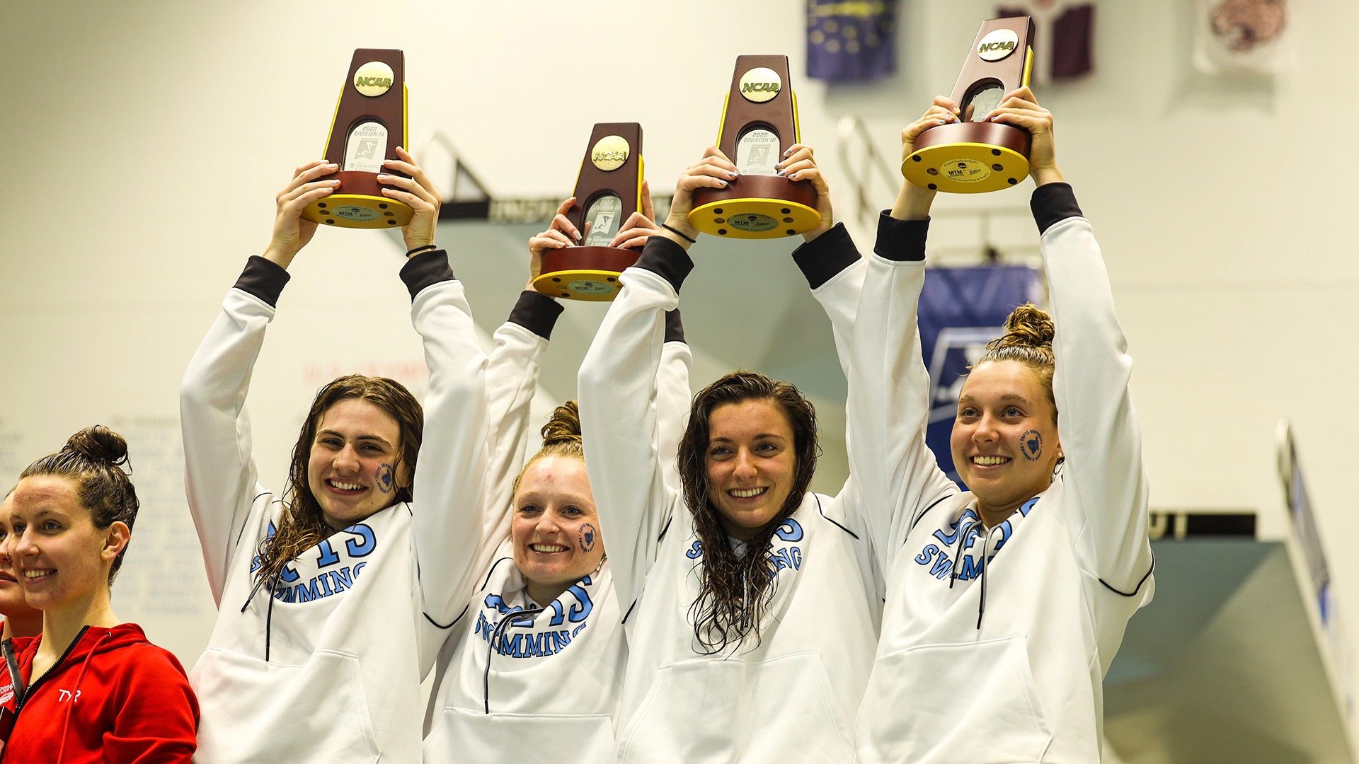 Isakoff (second from right) celebrates Tufts' first NCAA relay title — a defining moment in her student-athlete career. (Photo courtesy of Katelin Isakoff)