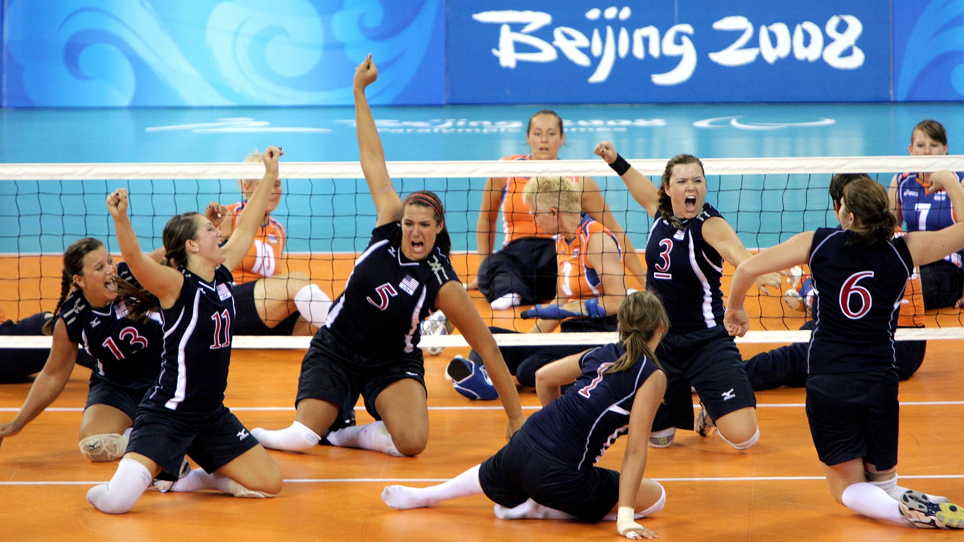 Holloway Bridge, No. 5, celebrates during Team USA's run to winning the silver medal in Beijing in 2008. It marked her first Paralympics after being introduced to the sport while a basketball player at CSUN.