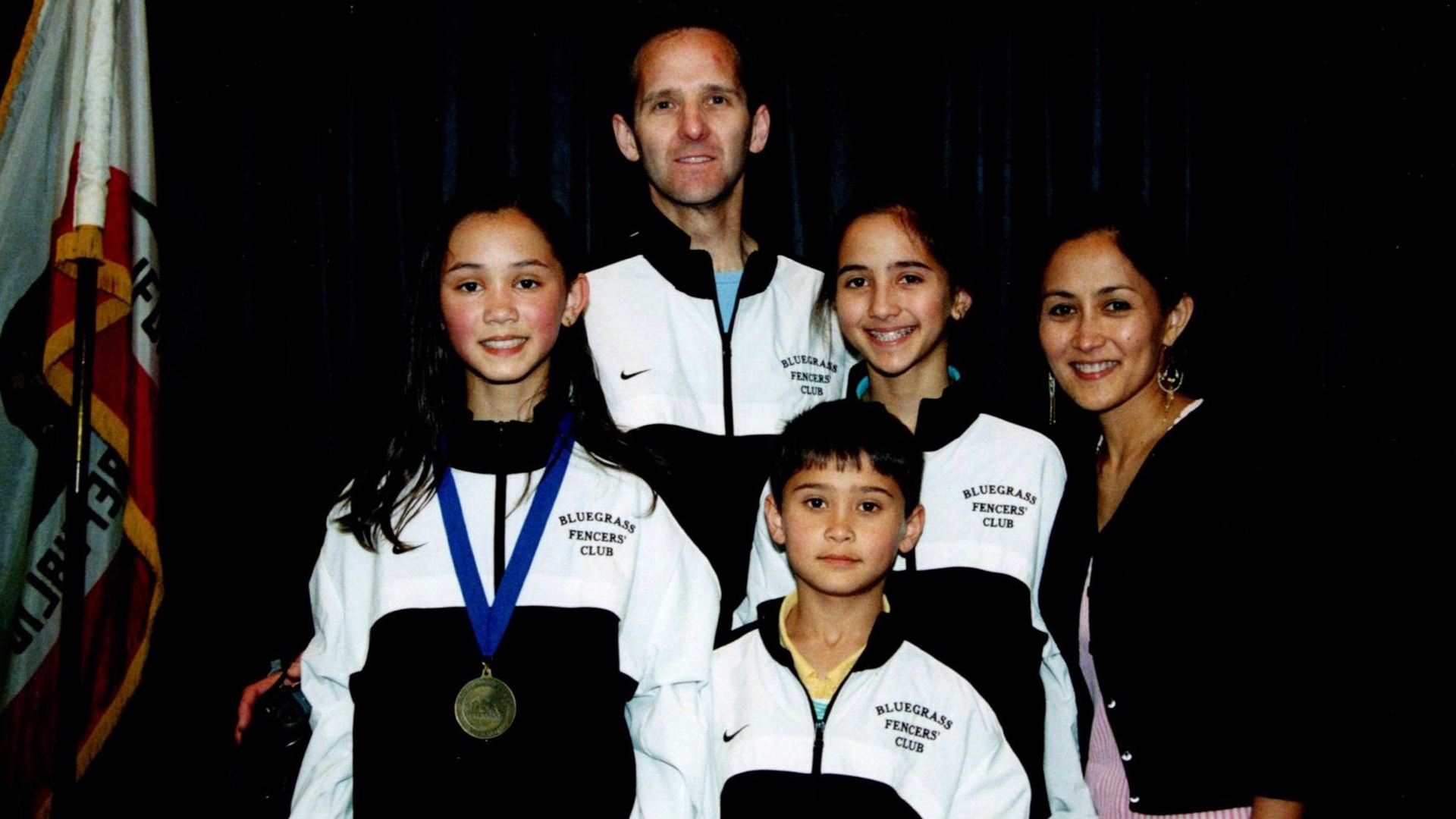 Family affair: The Kiefer family poses together after Lee's fencing tournament. Her father inspired the family's affinity for the sport.