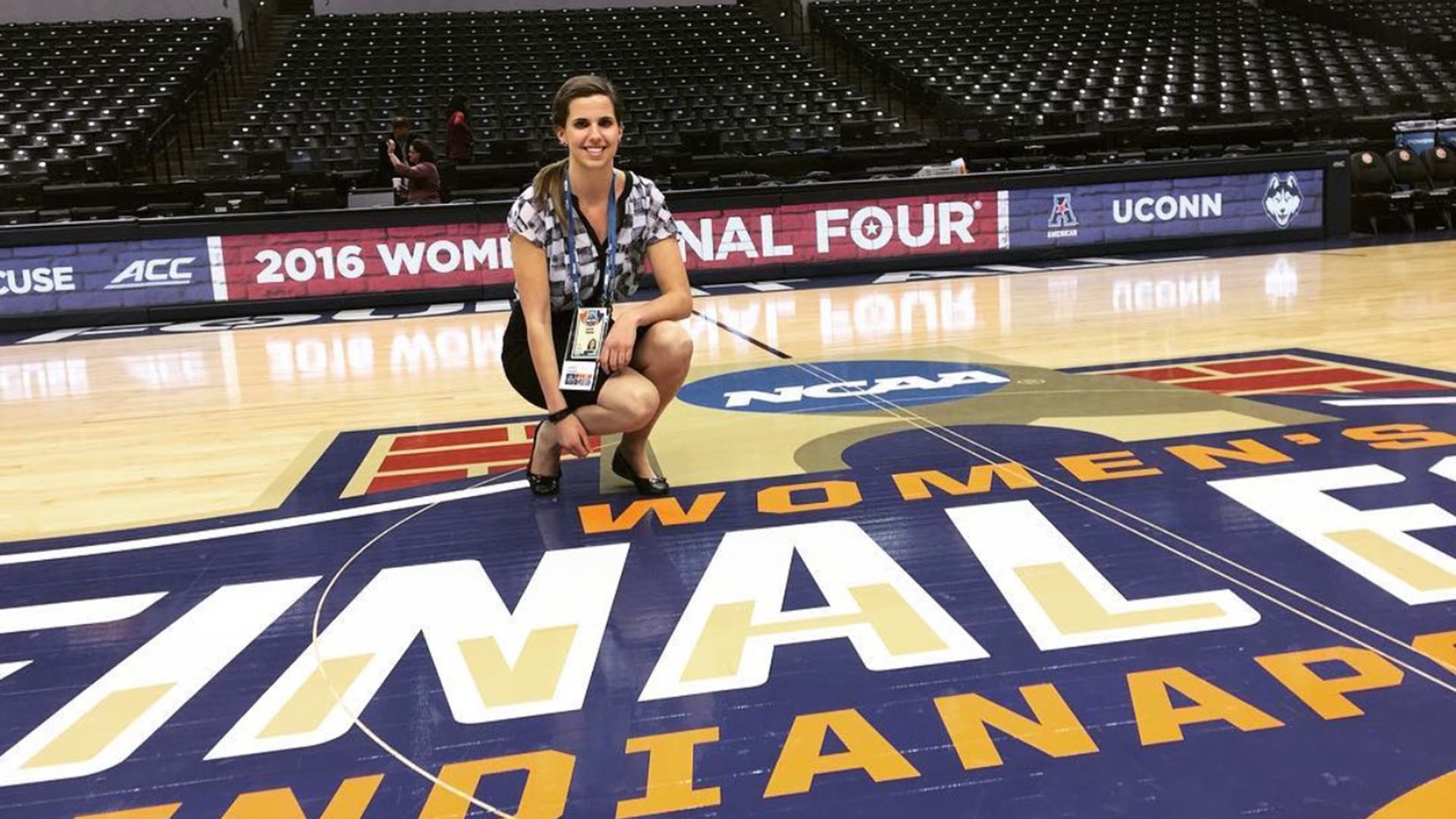 Lauren Gilligan poses on the court during the 2016 Women's Final Four in Indianapolis. (Photo courtesy of Lauren Gilligan)