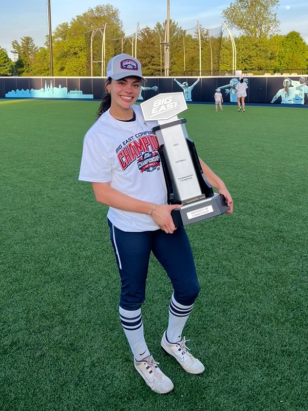 Lexi Hastings poses with Big East Championship Trophy