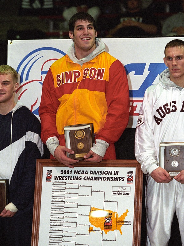Simpson's Nick Ackerman posing with his Division III national championship trophy. (Photos courtesy of Nick Ackerman)