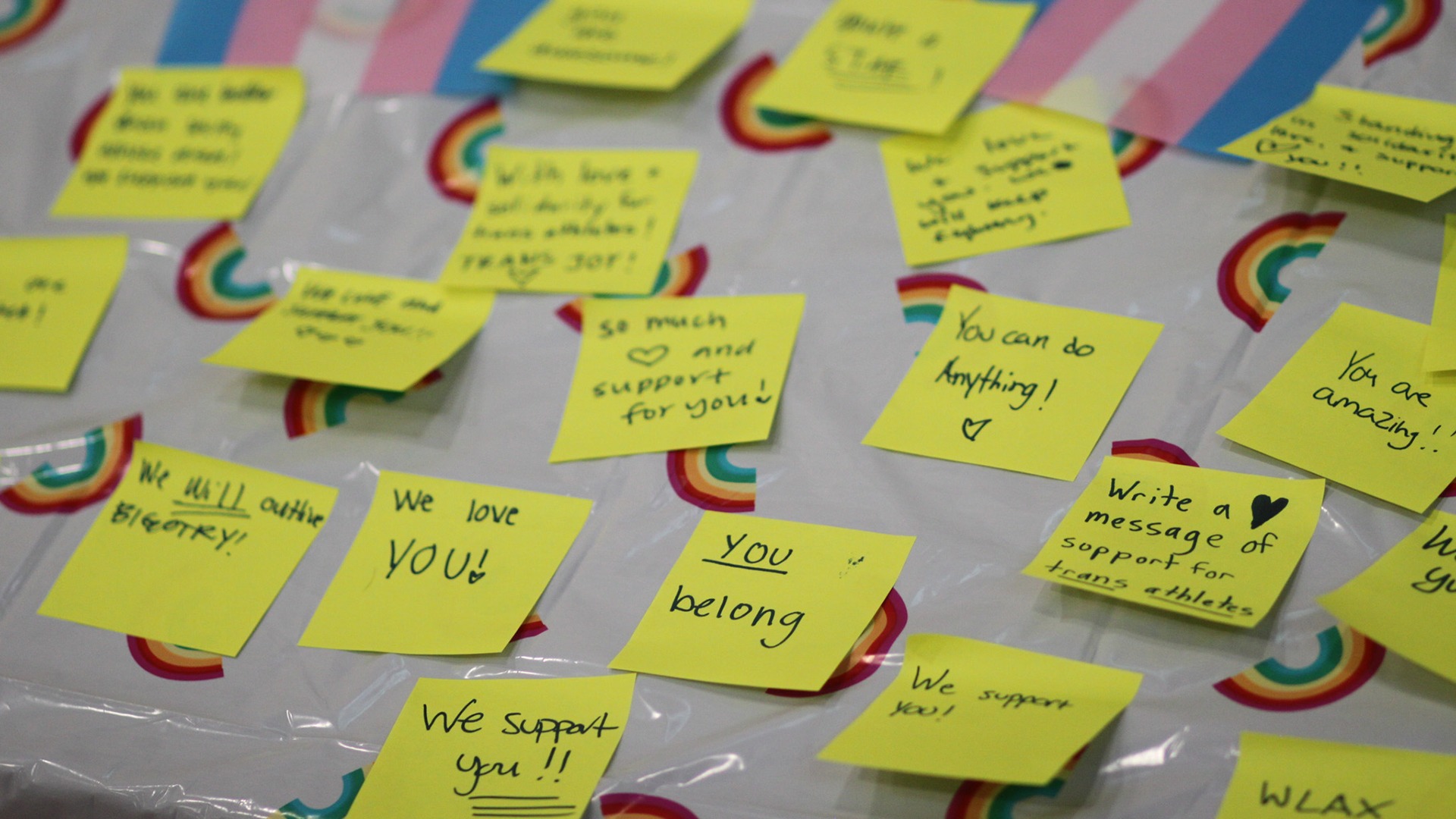 A Play with Pride event included having people write supportive messages on sticky notes.