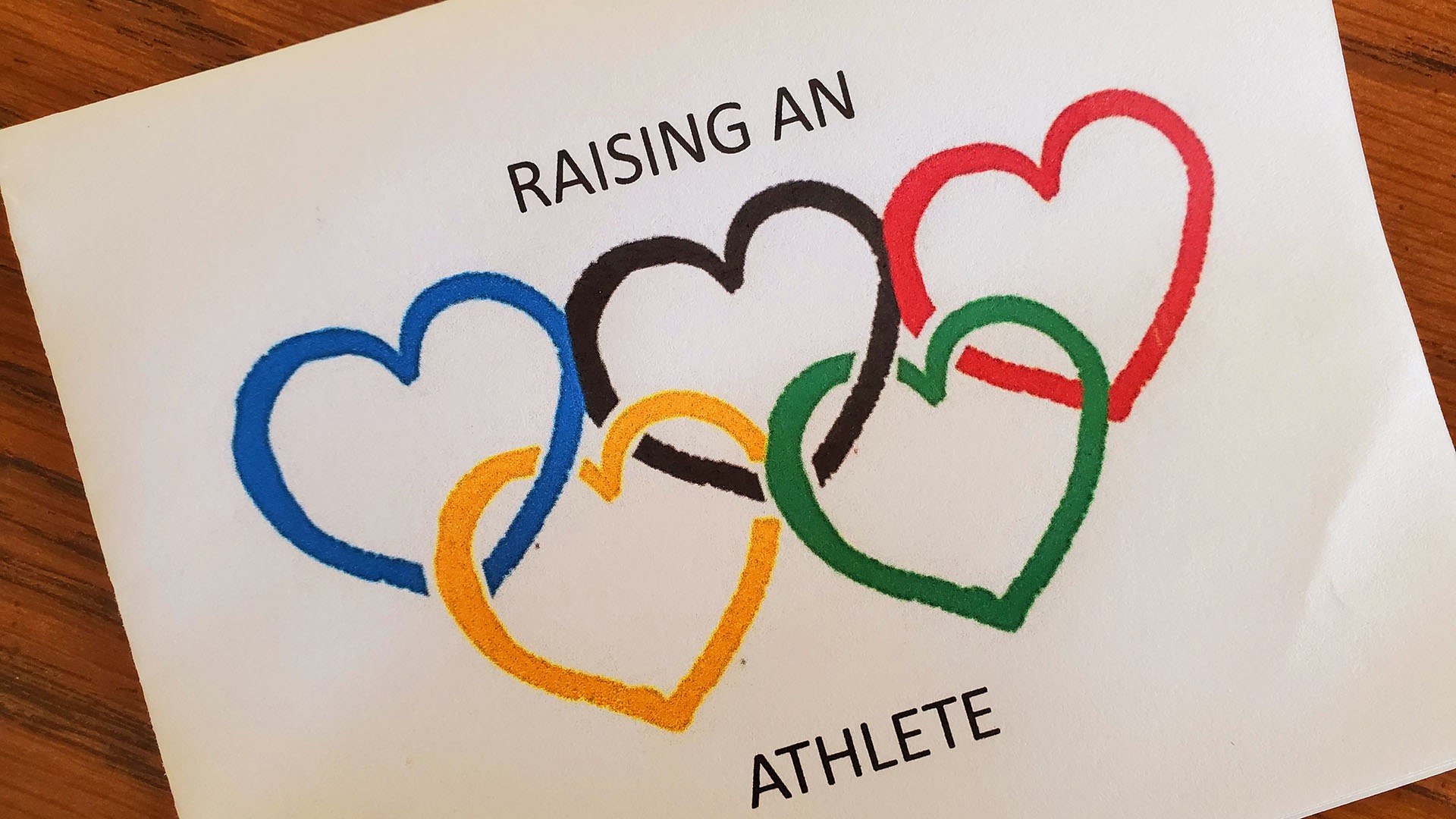 Melissa Doyle surprised her parents with a Valentine's Day card sporting heart-shaped Olympic rings to tell them she made the Olympic officiating roster. (Photo courtesy of Melissa Doyle)