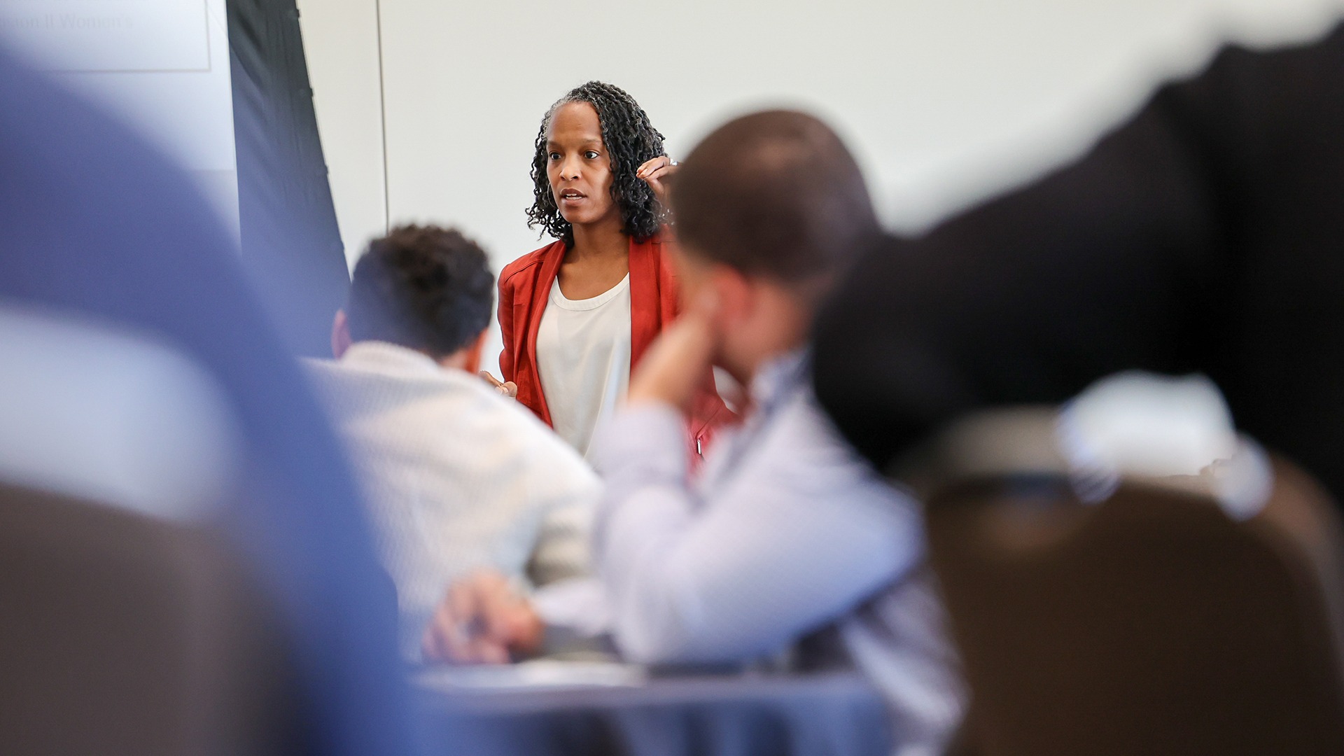 Nyaka NiiLampti, vice president of wellness and clinical services at the NFL, spoke to the group at the NCAA and NFL Coaches Academy about what it means to be a coach or student-athlete and the corresponding stresses of those roles.