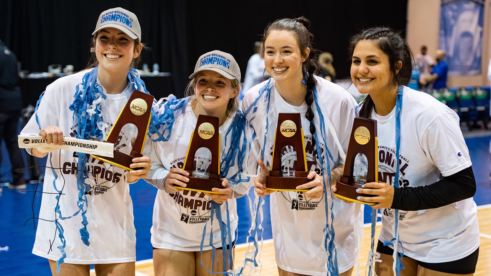 Bryli Contreras (right) with her teammates after winning the 2022 NCAA Division II Women's Volleyball Championship in Seattle