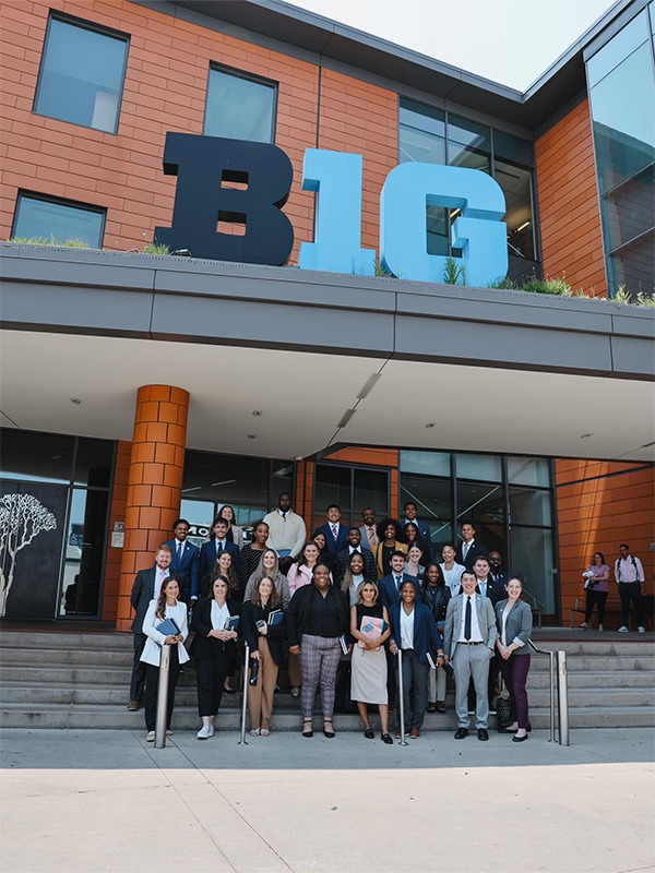 Barnes and the 2023 postgraduate internship class visiting the Big Ten conference office. (Photo courtesy of Alexis Barnes)