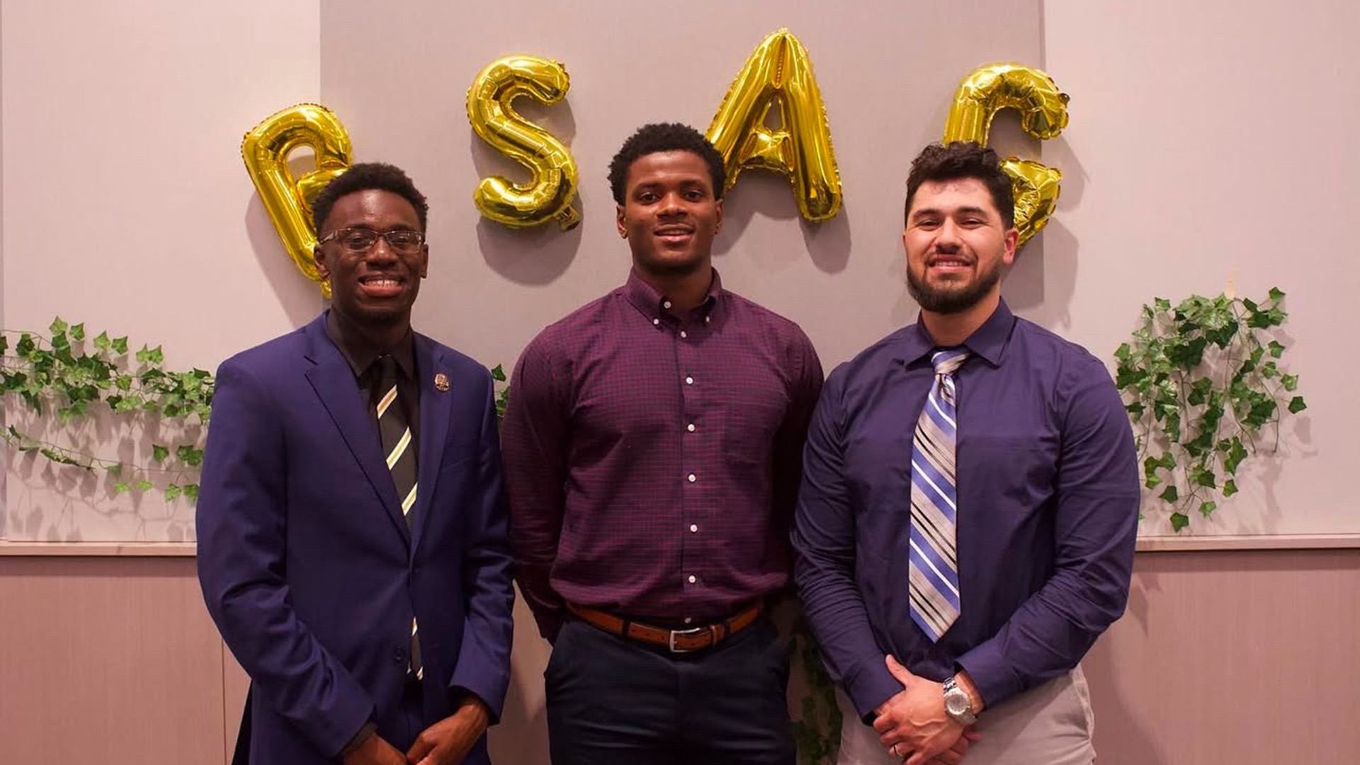 Point-du-Jour with Black Student-Athlete Group co-founder Dubem Nnake (center) and advisor Tristan Reaves (right).