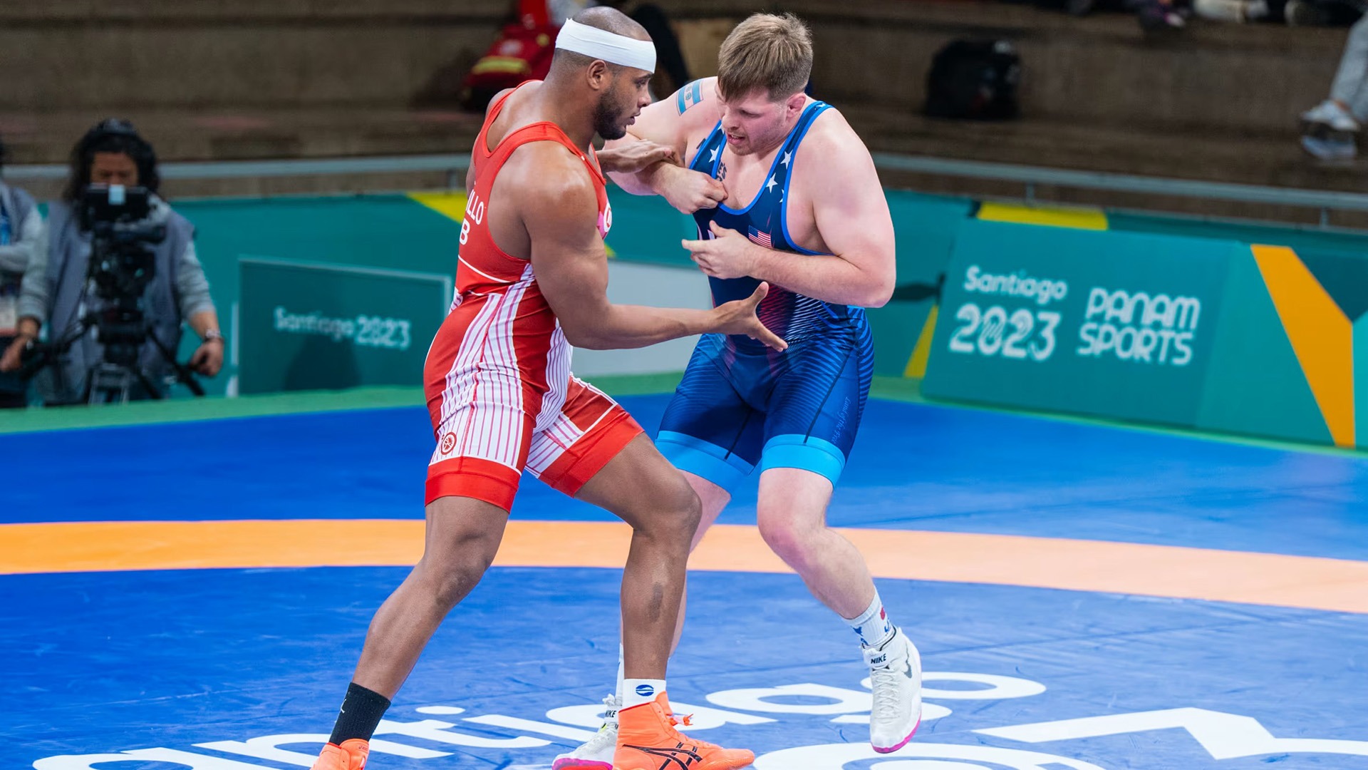Rau, a former Division III standout at Elmhurst, nearly quit wrestling multiple times in his career but now uses his journey of persistence as a motivation example as an assistant coach at Northwestern. (Photo courtesy of USA Wrestling)