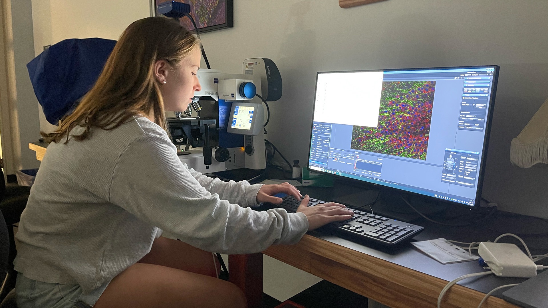 Roman, a biology major and standout lacrosse defender at Saint Michael's, combines her passion for science and sport in the college's neuroscience lab.