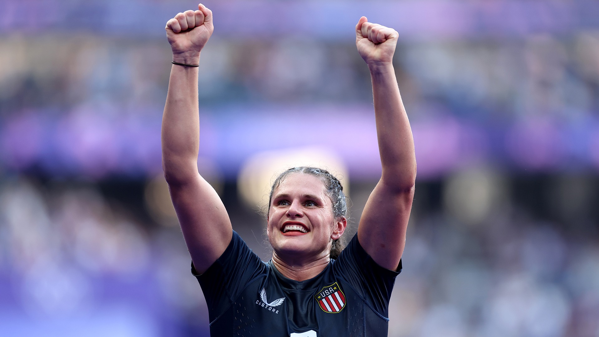 Ilona Maher, captain of the U.S. women's rugby sevens team and a former Quinnipiac star, celebrates during the team's historic bronze medal match at the 2024 Paris Olympics. Maher's presence both on and off the field has been instrumental in growing the sport's visibility.