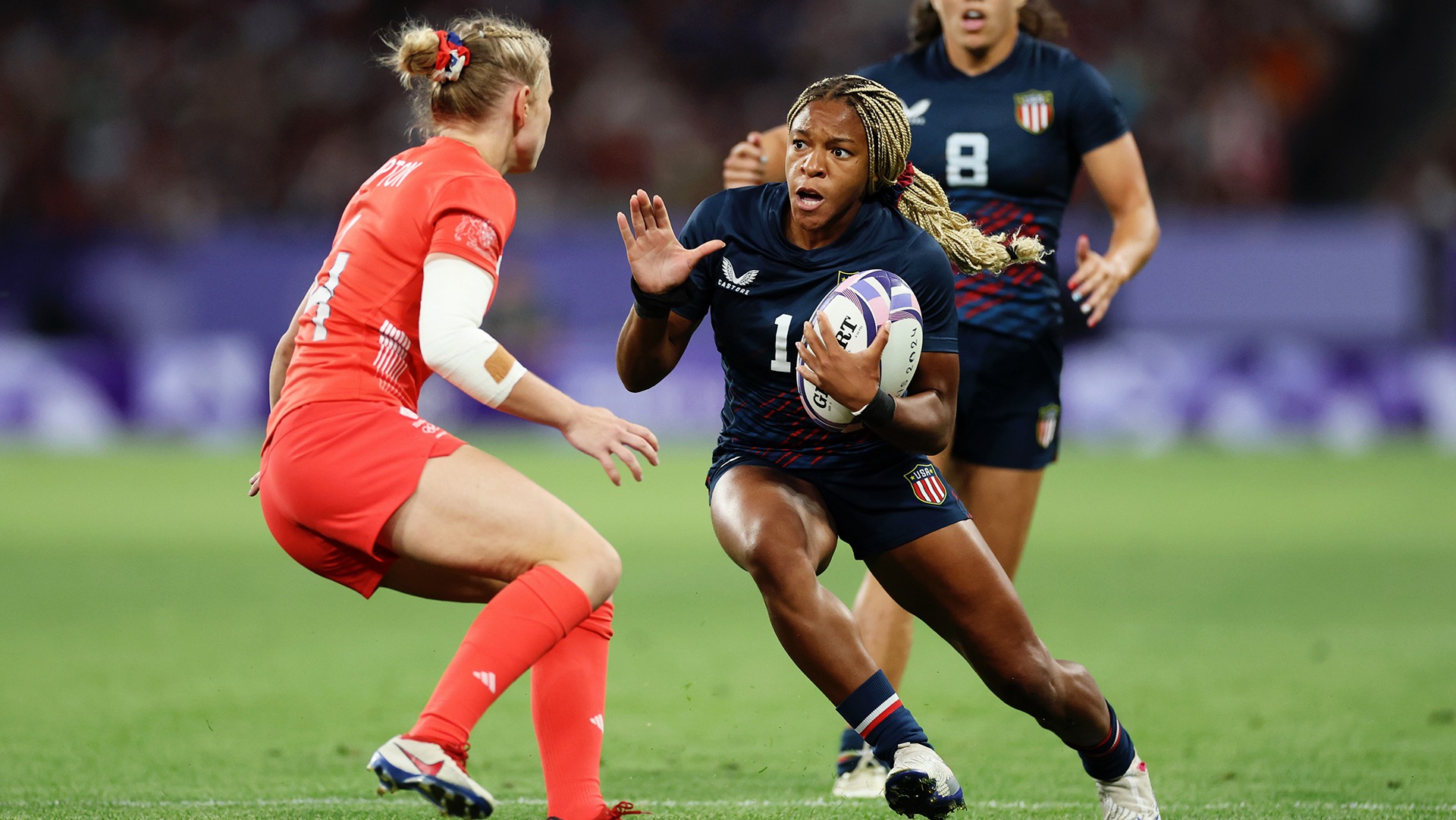 Ariana Ramsey, a former Dartmouth standout, uses her speed and agility to score a crucial try for the U.S. women's rugby sevens team in its bronze medal match against Australia at the 2024 Paris Olympics. Ramsey's transition from track to rugby has been a key component of her athletic journey.