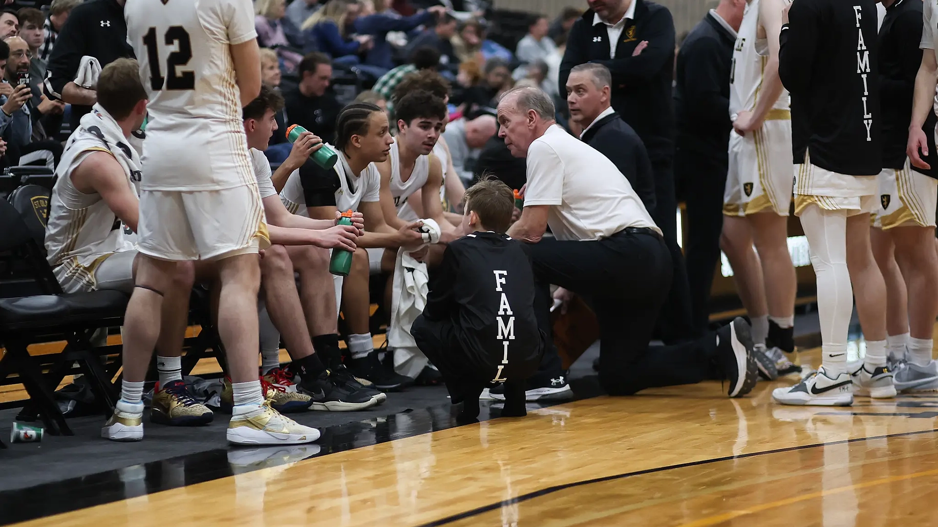 Torin in the team huddle at 2024 Senior Day