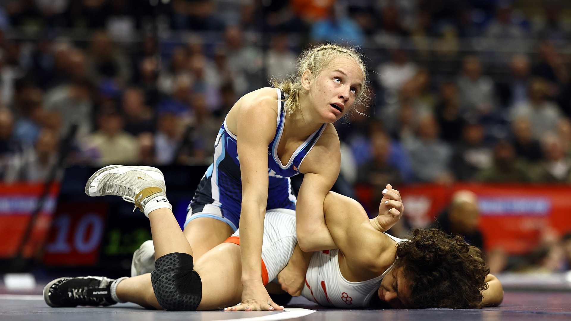 Mortimer wrestles an opponent during the U.S. Olympic Trials in April. She finished third in her weight class. (Photo by Tim Nwachukwu / Getty Images)