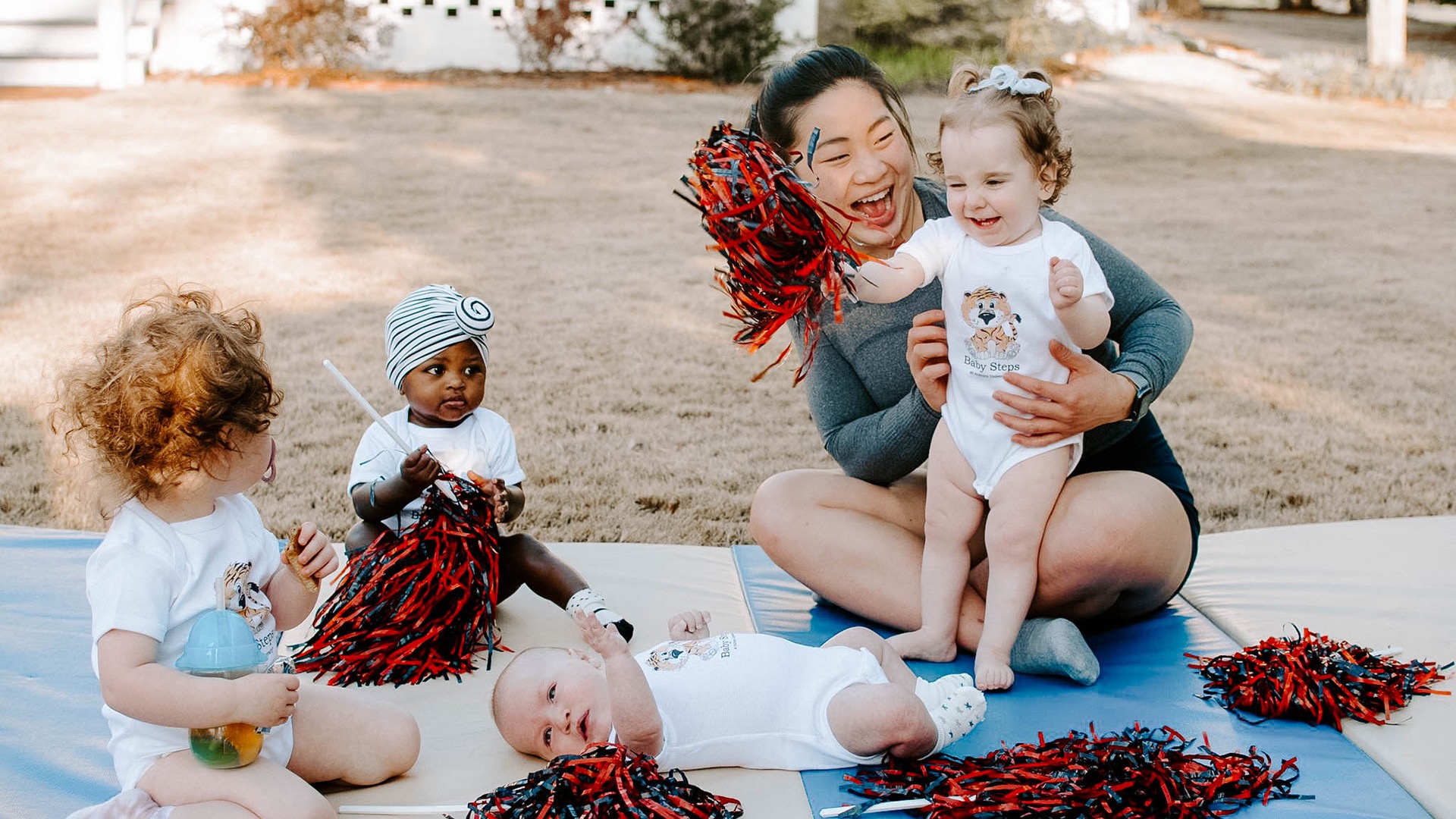 Groth took part in Baby Steps community events, attending photo shoots with the mothers and their children.