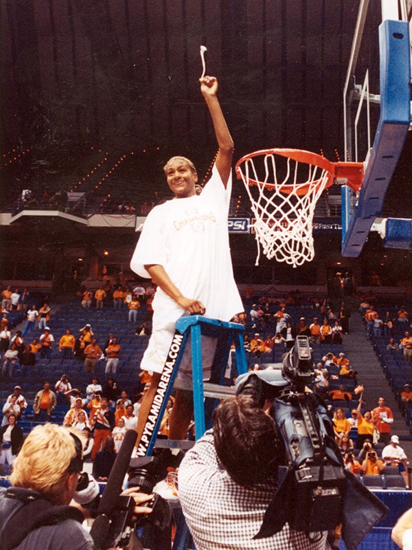 Catchings holds up her share of the national championship net her freshman year.