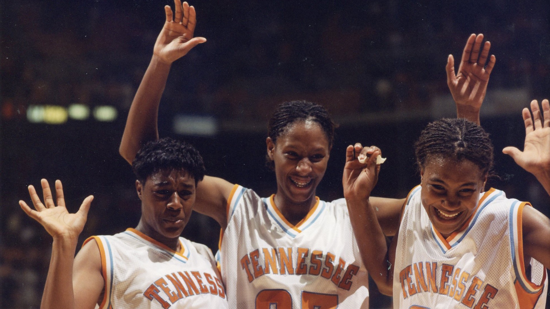 The three "Meeks" - Semeka Randall (21), Chamique Holdsclaw (23) and Tamika Catchings - are all smiles after a game.