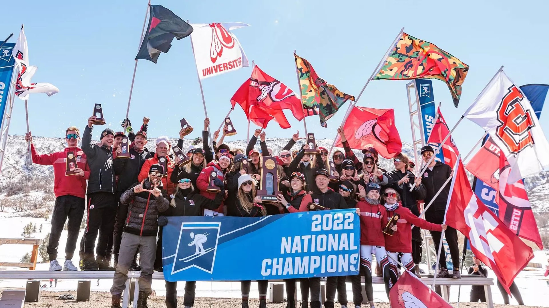 The 2022 Utah skiing team celebrates after winning the National Collegiate Skiing Championships. (Photo courtesy of Utah)