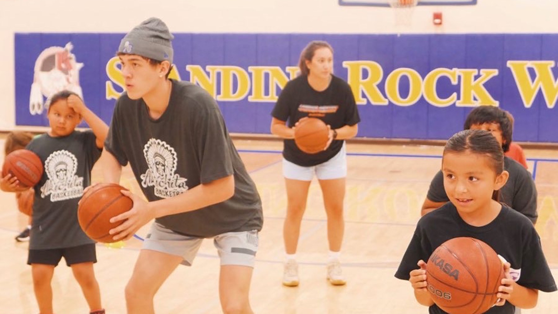 In a session led by Eaglestaff, young players learn the fundamentals of basketball and gain inspiration. (Photo courtesy of Treysen Eaglestaff)