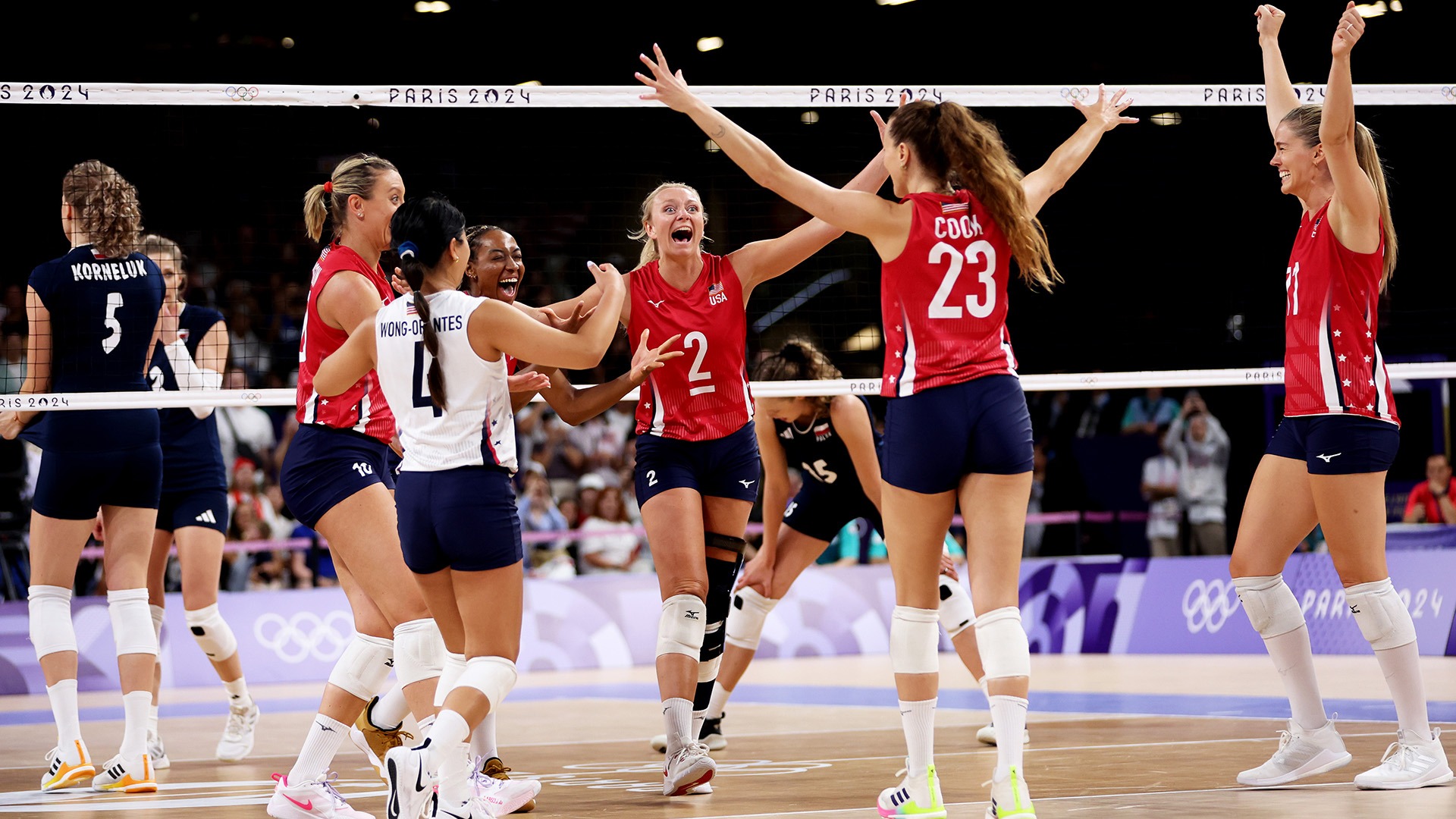 Team USA volleyball players credit the team's success to a powerful culture of support and belief, fostered by culture consultant Enquist. (Photo by Clive Brunskill / Getty Images)