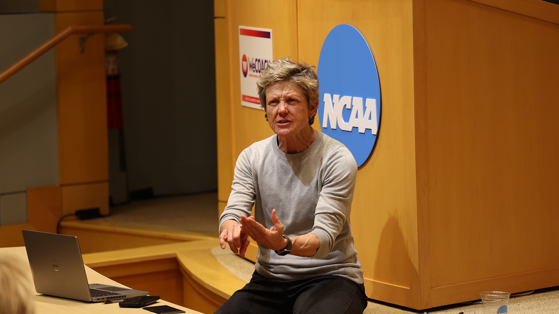 Former Michigan softball head coach Carol Hutchins speaks to attendees of the WeCOACH 