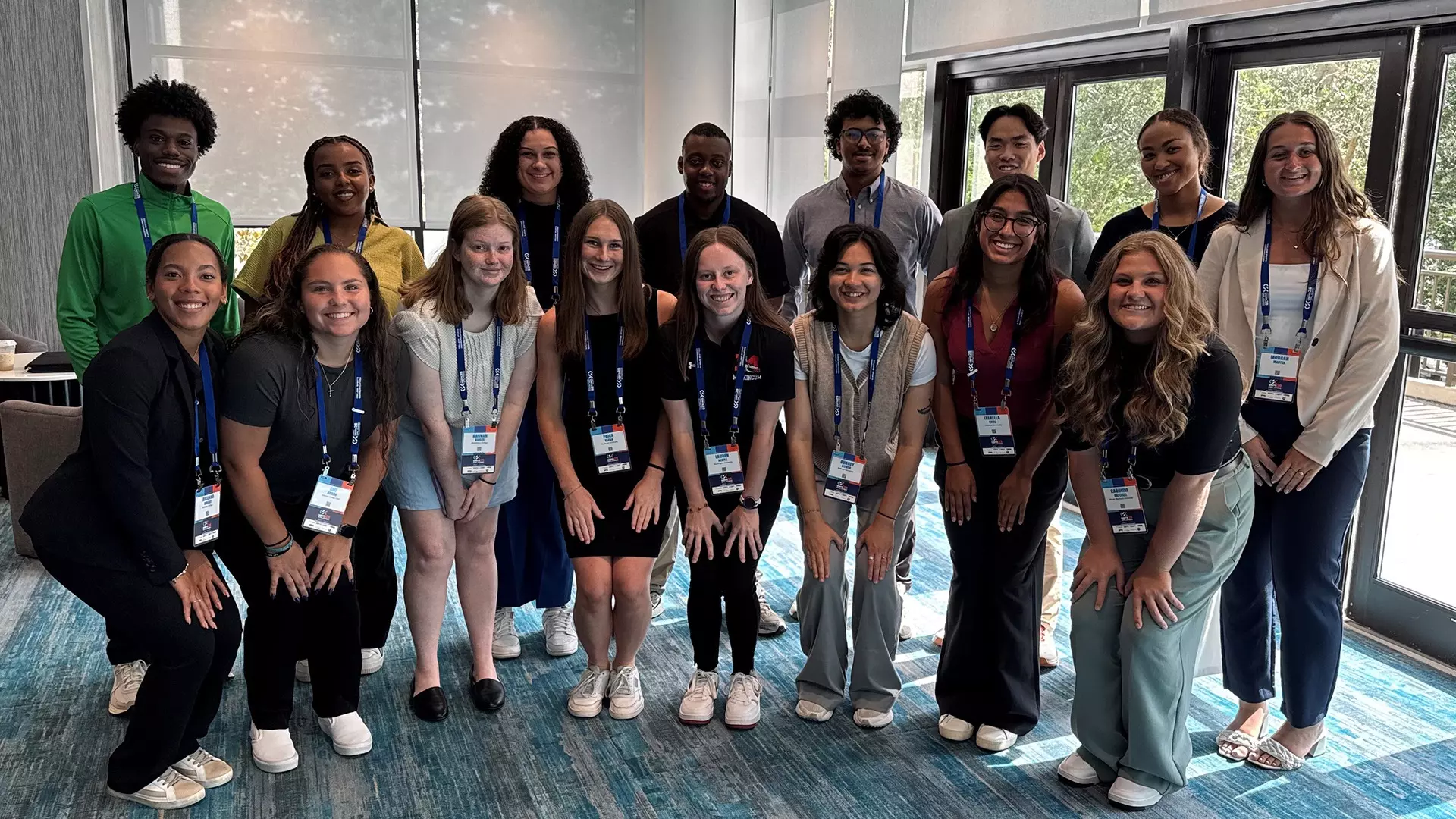 Previous members of the DIII CSC Student Program pose for a group picture.