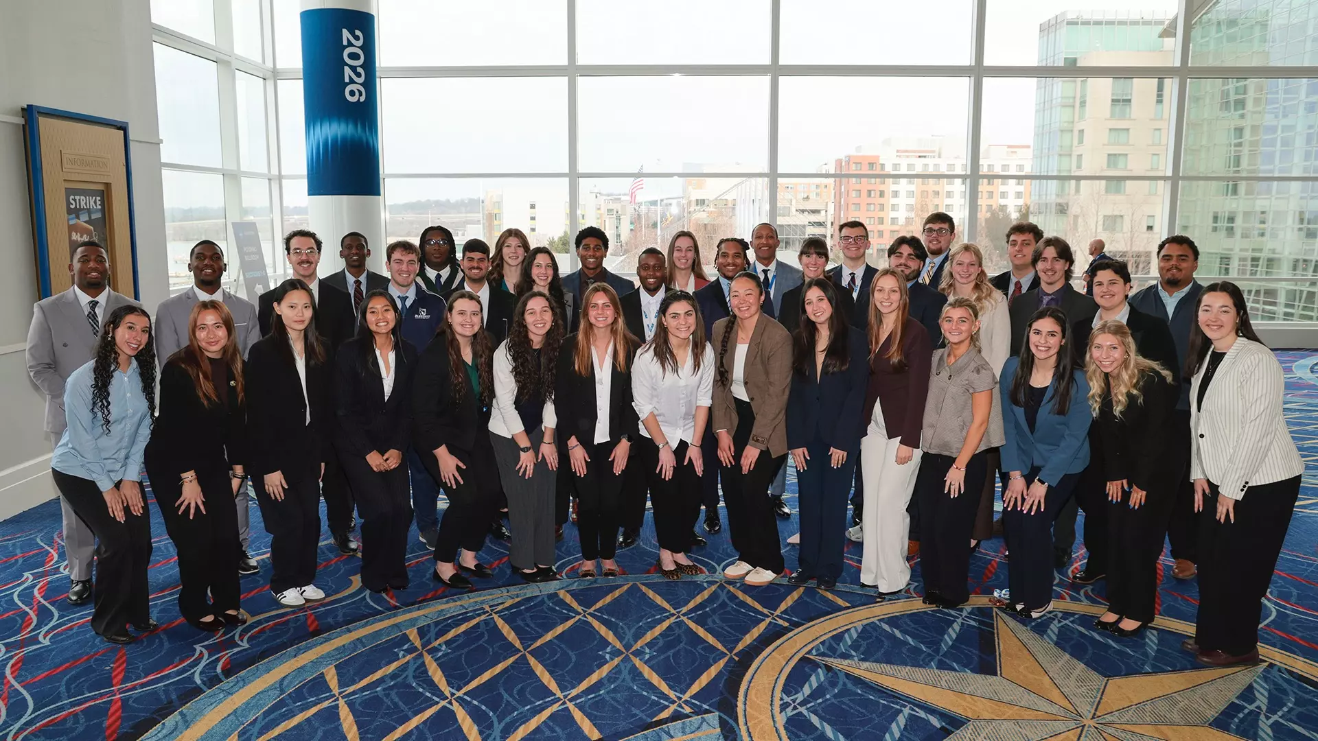 Participants in the 2026 DIII Student Immersion Program pose for a group picture at the 2026 NCAA Convention.