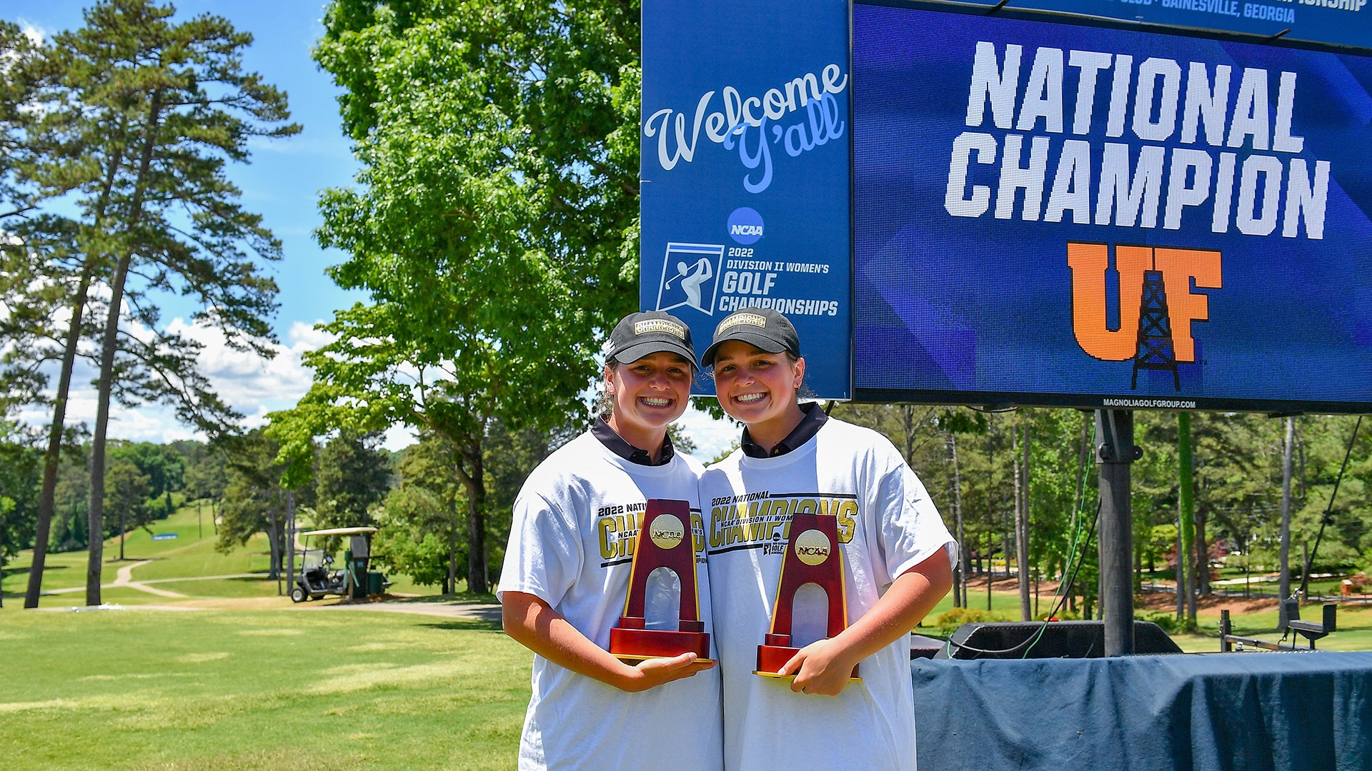 Mary Kelly Mulcahy (left) and her sister, Erin, after winning the 2022 NCAA Division II Women's Golf Championships.