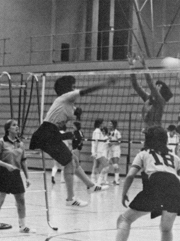 Alpha Alexander sends a ball over a net during a Wooster volleyball match. Alexander was a four-sport student-athlete, also playing basketball, tennis and lacrosse during her four years. (Photos courtesy of the Black Women in Sport Foundation)