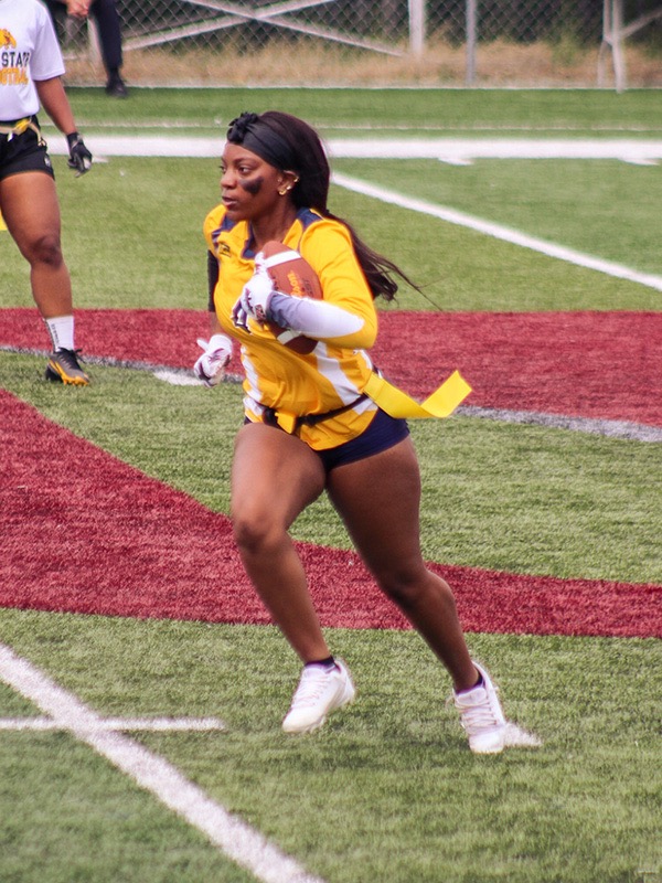 Destiny O'Neal carries the ball in a game during the inaugural year of Johnson C. Smith's flag football team in 2024-25. (Photo courtesy of Destiny O'Neal)